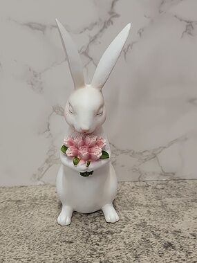 Bunny Rabbit holding a bouquet of flowers